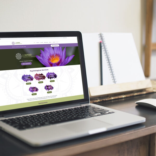 J snyder therapy screen mockup on desk