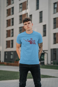 Man wearing Nick castellanos I f*uck with Philly tee shirt with hands in his back pocket