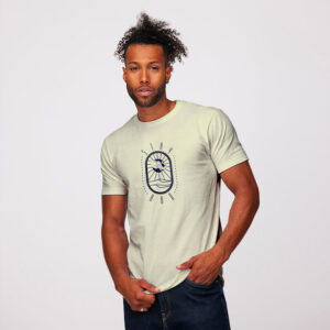 man wearing cream colored shirt with stay rad artwork